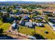 Aerial view of a home with a large yard and surrounding neighborhood at 5701 N 105Th Ln, Glendale, AZ 85307