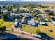 Wide aerial view of the property and surrounding neighborhood at 5701 N 105Th Ln, Glendale, AZ 85307