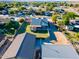 Aerial view of a home with a large backyard and detached garage at 5701 N 105Th Ln, Glendale, AZ 85307