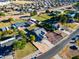 Aerial view of a single-Gathering home with a spacious yard and surrounding area at 5701 N 105Th Ln, Glendale, AZ 85307