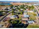 Aerial view showing a house, outbuildings, and a large lot in a residential area at 5701 N 105Th Ln, Glendale, AZ 85307