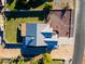 Aerial view of a house with a backyard and rock landscaping at 5701 N 105Th Ln, Glendale, AZ 85307