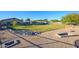 Large backyard with gravel areas, rock features, and a spacious grassy area at 5701 N 105Th Ln, Glendale, AZ 85307