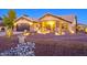 Stunning ranch-style home with a landscaped front yard and attractive exterior finishes at 5701 N 105Th Ln, Glendale, AZ 85307