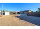 Large detached garage with ample space for vehicles and storage at 5701 N 105Th Ln, Glendale, AZ 85307