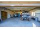 Spacious garage with ample storage and room for vehicles and equipment at 5701 N 105Th Ln, Glendale, AZ 85307