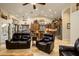 Open kitchen with custom wooden cabinetry and stainless steel appliances at 5701 N 105Th Ln, Glendale, AZ 85307