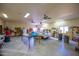Well-equipped workshop featuring multiple workbenches and tools at 5701 N 105Th Ln, Glendale, AZ 85307