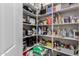 Well-organized pantry with plenty of shelving for storage at 7369 W Cactus Wren Way, Florence, AZ 85132