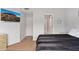 Bedroom with a queen-size bed, dresser, and en-suite bathroom at 7710 E Gainey Ranch Rd # 157, Scottsdale, AZ 85258
