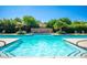 Inviting community pool with ample deck space for lounging at 7710 E Gainey Ranch Rd # 157, Scottsdale, AZ 85258