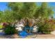 Blue decorative bicycle art piece in landscaped area at 7710 E Gainey Ranch Rd # 157, Scottsdale, AZ 85258