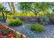 Community entrance sign with landscaping and stonework at 7710 E Gainey Ranch Rd # 157, Scottsdale, AZ 85258