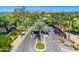 Gated community entrance with landscaping and security at 7710 E Gainey Ranch Rd # 157, Scottsdale, AZ 85258