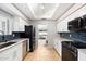 Modern kitchen with stainless steel appliances and granite counters at 7710 E Gainey Ranch Rd # 157, Scottsdale, AZ 85258