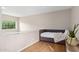 Upstairs loft area with a daybed and large window at 7710 E Gainey Ranch Rd # 157, Scottsdale, AZ 85258