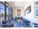 Relaxing lounge area with comfortable seating and views of tennis courts at 7710 E Gainey Ranch Rd # 157, Scottsdale, AZ 85258