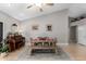 Dining area with wood table, piano and access to backyard at 937 E Knight Ln, Tempe, AZ 85284