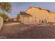 Attached garage with additional exterior storage space at 1409 E Dove Pl, Casa Grande, AZ 85122