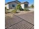 Single story home with attached garage and landscaped yard at 16244 N 21 St, Phoenix, AZ 85022