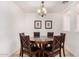 Bright dining room with a round table and six chairs at 17433 W Statler St, Surprise, AZ 85388