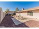 Relaxing backyard patio with seating area and gravel at 1745 E Palm Parke Blvd, Casa Grande, AZ 85122