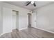 Bedroom with wood-look flooring and closet at 1941 W Topeka Dr, Phoenix, AZ 85027