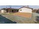 Back exterior view showing patio and yard at 1941 W Topeka Dr, Phoenix, AZ 85027