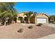 Single-story house with a two-car garage and desert landscaping at 1964 W Sawtooth Way, San Tan Valley, AZ 85144