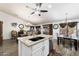 Open kitchen with island, granite countertops and breakfast area at 1964 W Sawtooth Way, San Tan Valley, AZ 85144