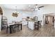 Modern kitchen with white cabinets, stainless steel appliances, and an island at 1964 W Sawtooth Way, San Tan Valley, AZ 85144