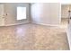 Bright living room featuring tile floors and a fireplace at 4441 E Coconino St, Phoenix, AZ 85044