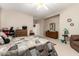 Spacious bedroom with ample natural light and a comfortable sitting area at 45759 W Morning View Ln, Maricopa, AZ 85139