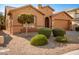 One-story house with landscaped yard, two-car garage, and desert landscaping at 45759 W Morning View Ln, Maricopa, AZ 85139