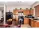 Well-equipped kitchen with ample counter space and modern appliances at 45759 W Morning View Ln, Maricopa, AZ 85139
