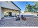 Gravel backyard with seating area and fire pit at 4714 W Nutmeg Ave, Coolidge, AZ 85128