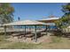 Park picnic area with tables, benches, and a shaded shelter at 5213 W Sweetwater Ave, Glendale, AZ 85304