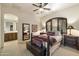 Guest bedroom with a queen-size bed and en-suite bathroom at 8128 E Greythorn Dr, Gold Canyon, AZ 85118