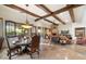 Dining area with table, chairs, and views from large windows at 8128 E Greythorn Dr, Gold Canyon, AZ 85118