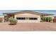 Front view of a single-story manufactured home with a covered carport at 8140 E Cactus Dr, Mesa, AZ 85208