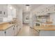 Kitchen with light wood countertops and white cabinets at 8140 E Cactus Dr, Mesa, AZ 85208