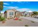 Charming house with gravel driveway and desert landscaping at 9788 E Hay Loft Dr, Florence, AZ 85132