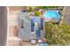 Aerial view showcasing home with solar panels and pool at 2328 N Roca St, Mesa, AZ 85213