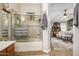 Clean bathroom with a shower/tub combo and updated tile at 2328 N Roca St, Mesa, AZ 85213