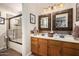 Double vanity bathroom with a shower and updated fixtures at 2328 N Roca St, Mesa, AZ 85213