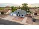 House exterior showcasing a two-car garage and landscaped front yard at 2328 N Roca St, Mesa, AZ 85213