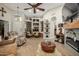 Spacious living room features a fireplace and built-in shelving at 2328 N Roca St, Mesa, AZ 85213