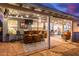 Outdoor patio with bar, seating, and string lights at 2328 N Roca St, Mesa, AZ 85213