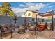 Cozy patio area with fire pit, seating, and hot tub at 2328 N Roca St, Mesa, AZ 85213