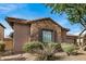 Single-story home with stone accents and a two-car garage at 29214 N 19Th Ln, Phoenix, AZ 85085